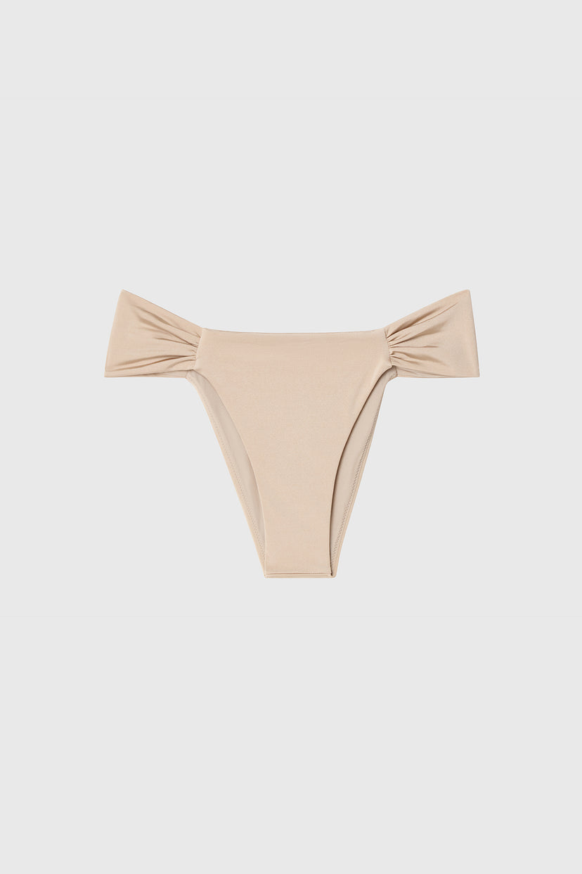 Beige brazilian bikini bottom with wide gathered side straps, on white background